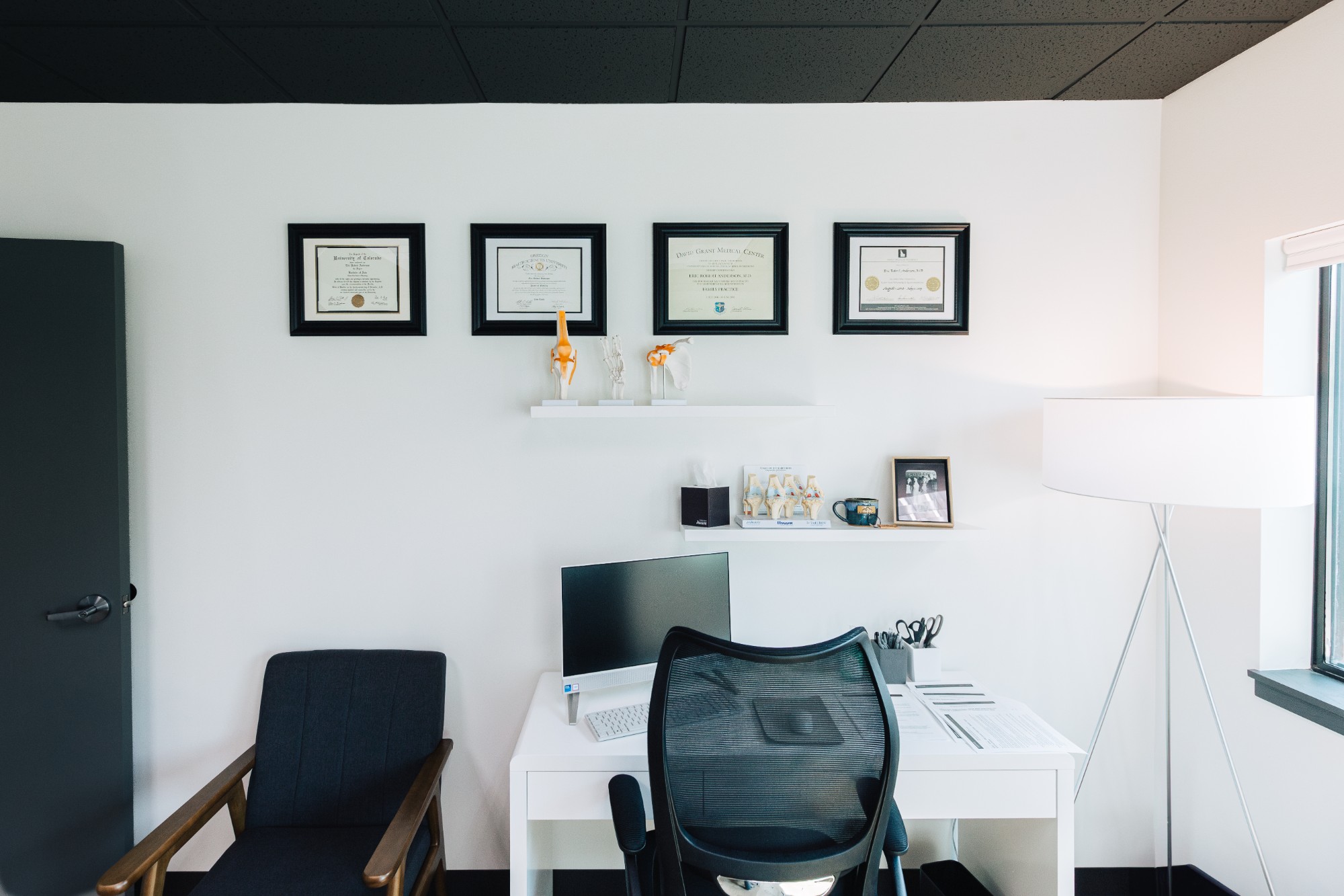 Physician office with framed credentials at Ridgepoint in Spokane